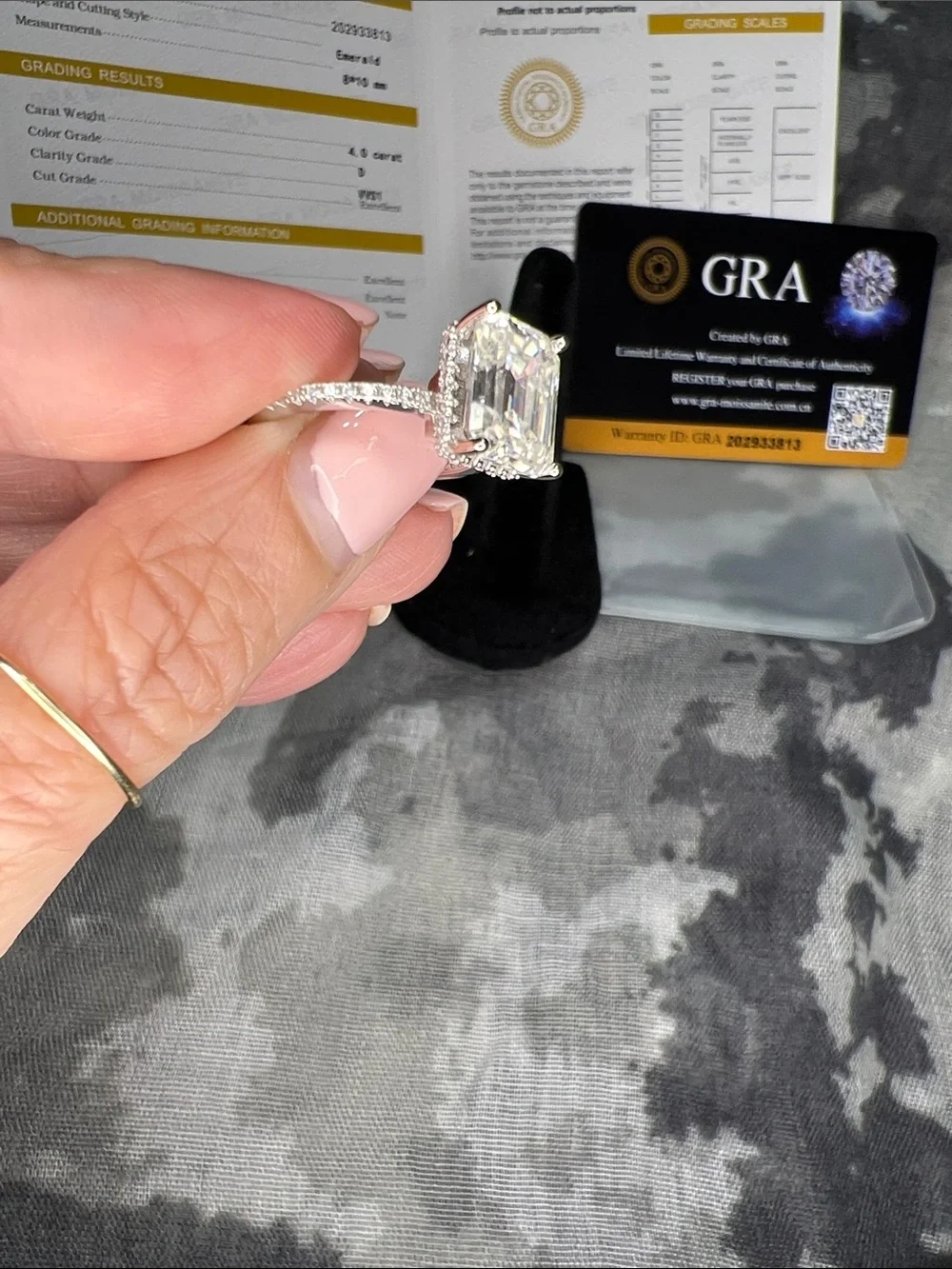 GRA 4ct Emerald Cut Moissanite Ring in Sparkling White